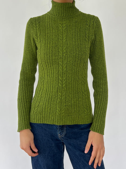 green turtleneck sweater